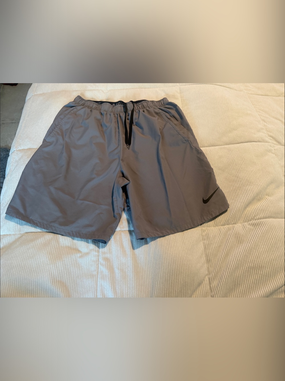 Nike Men's Light Gray Athletic Shorts with Black Swoosh